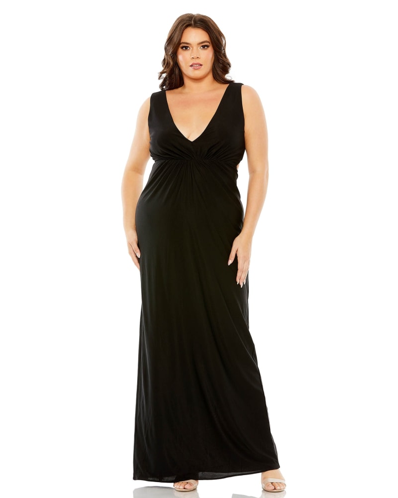 Front of a model wearing a size 14W Jersey V-Neckline Cutout Gown in Black by Mac Duggal. | dia_product_style_image_id:289801